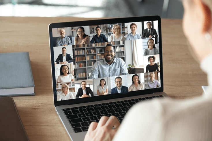 Woman on video conference with other people